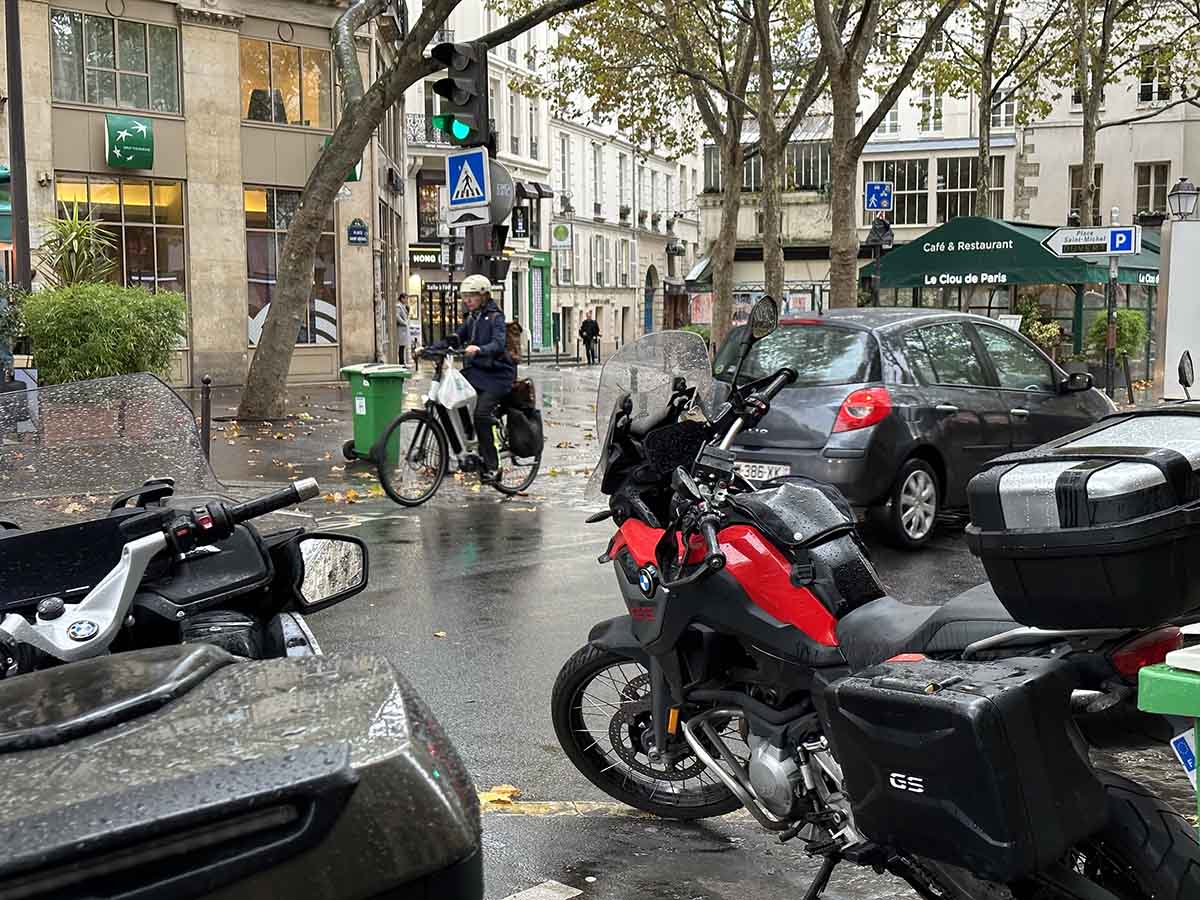 motorcycles and bicyclists in Paris in November
