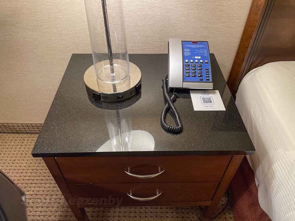Hilton ORD bedside nightstand with telephone