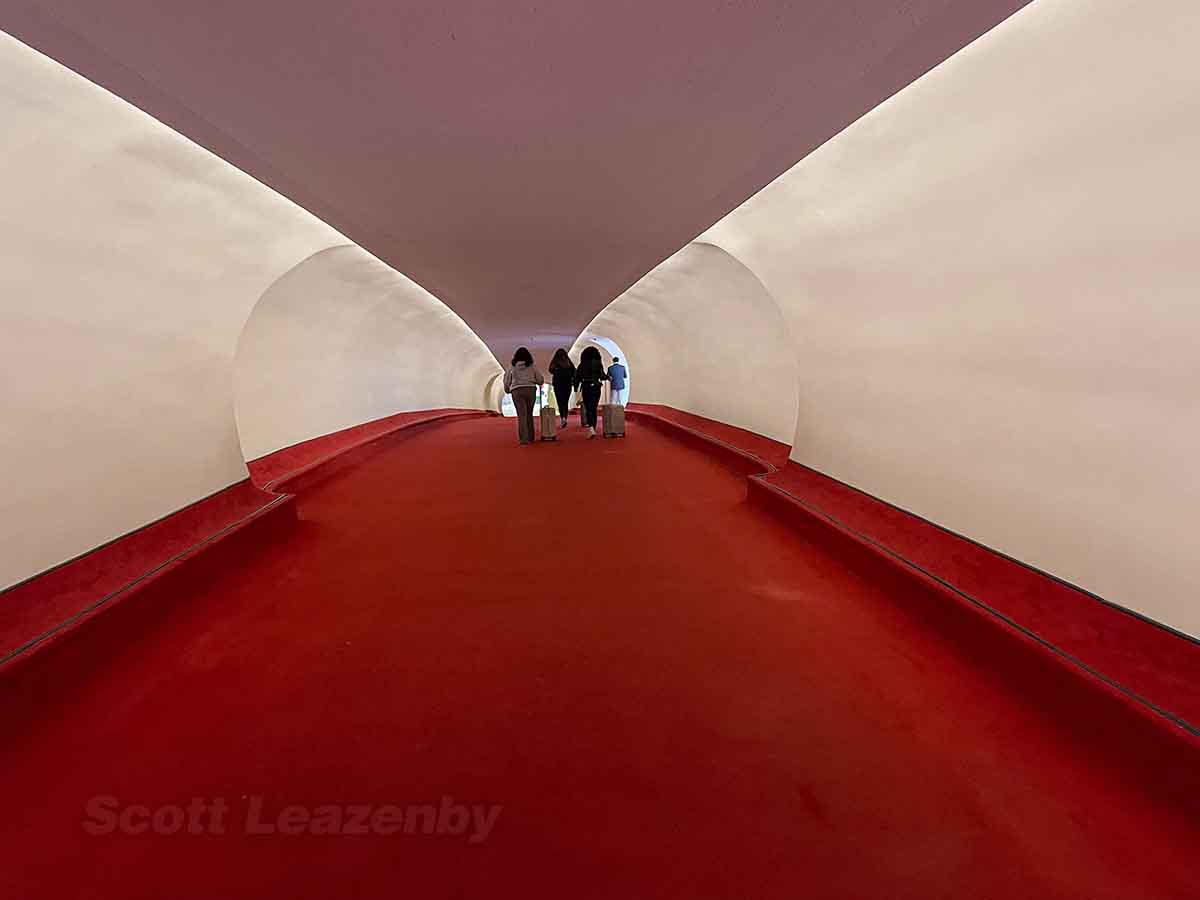Red carpeted hallway leading to TWA hotel