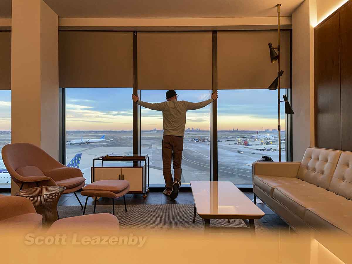 Scott Leazenby watching airplanes from the Howard Hughes suite TWA hotel