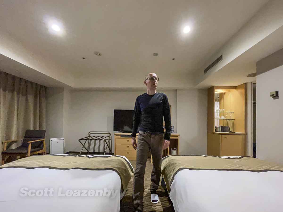 Scott wearing slippers in the Tobu Hotel Narita