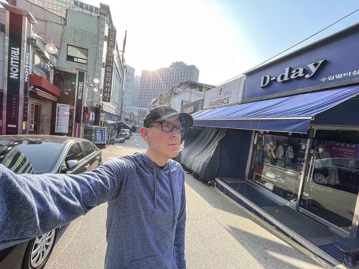 Scott Leazenby walking through the streets of Seoul South Korea