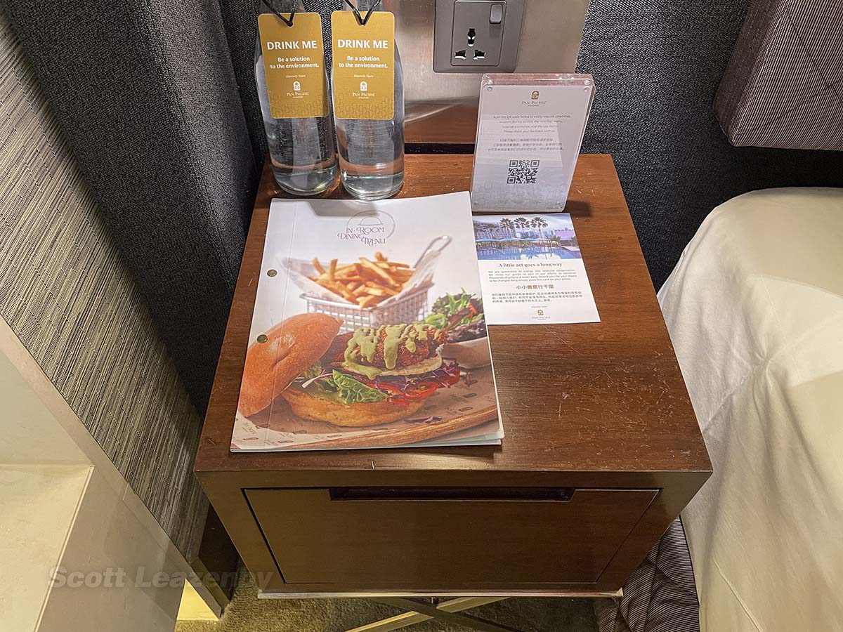 Bedside table with room service menu