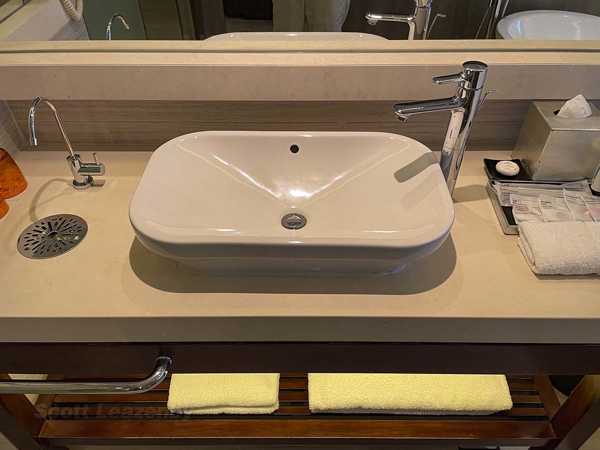 Bathroom sink with towels